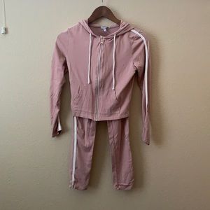 Pink and white track suit